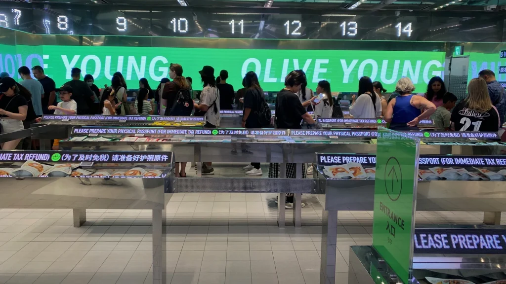 Customers inside an OLIVE YOUNG store in Myeongdong, Seoul