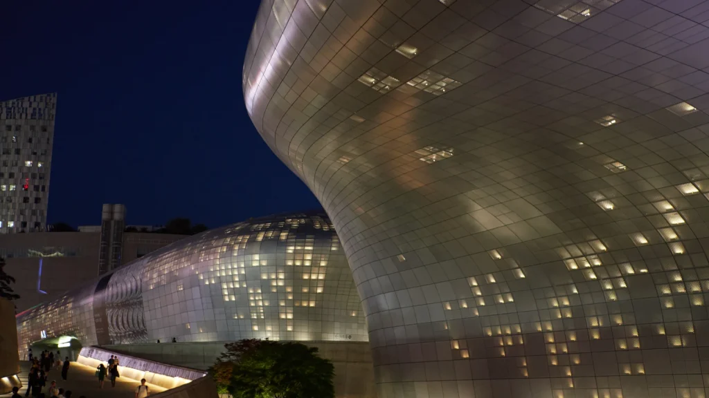 Dongdaemun Design Plaza illuminated at night in Seoul